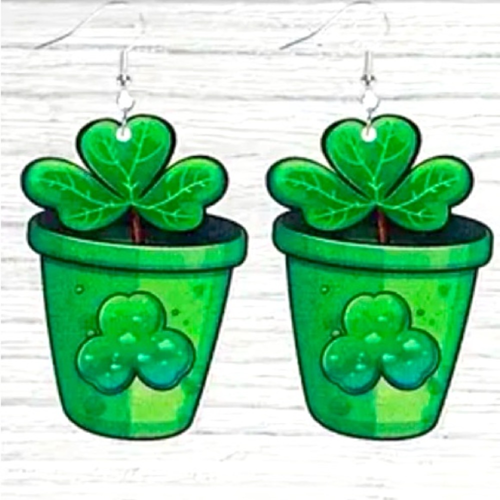 Shamrocks carved into the wooden surface. Lightweight and comfortable to wear.